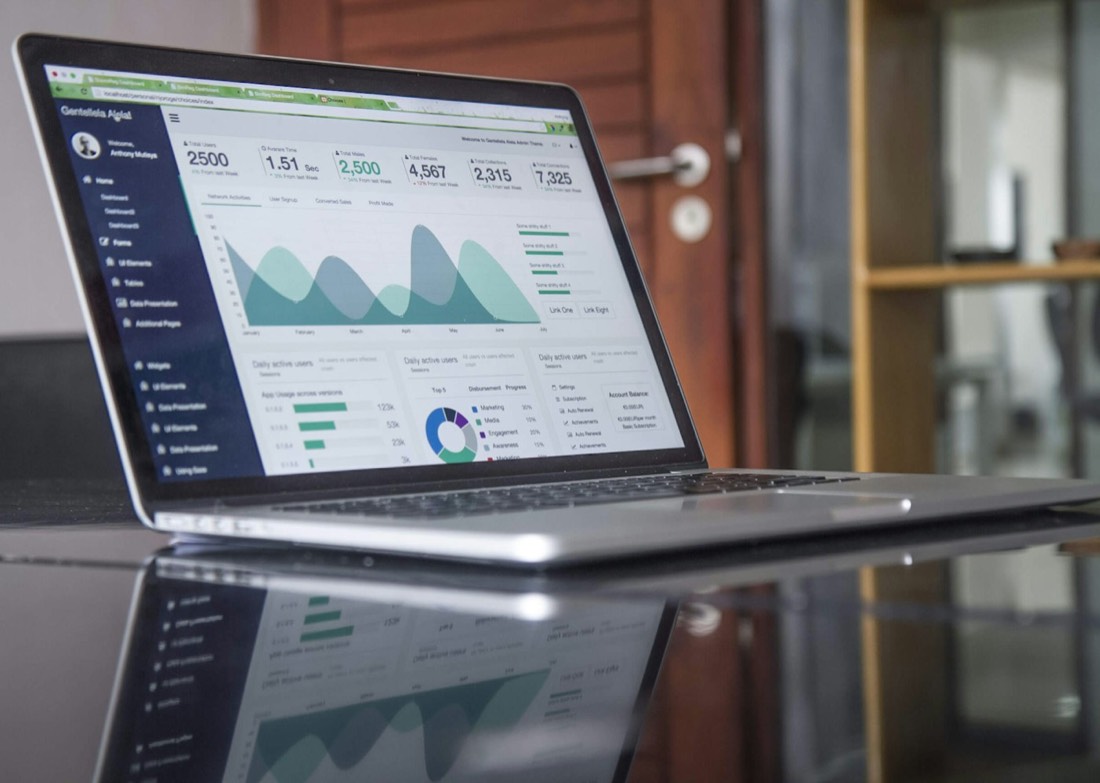 Laptop showing an email marketing analytics dashboard